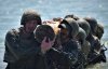 Под взрывы, в воде и грязи: показали жесткий экзамен украинских морских пехотинцев