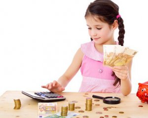 Як навчити дитину користуватися грошима