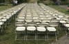 Перед посольством России выставили 298 пустых стульев