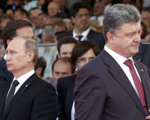 Порошенко поздравил Путина с днем России иском в суд