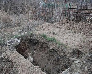 Копачі могил викинули небіжчицю з місця поховання