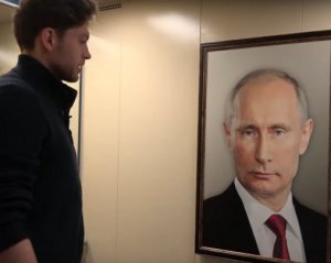 Черта повесили: как россияне реагировали на портрет Путина в лифте